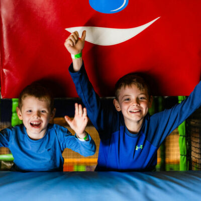 Young boys cheering in the soft play area at High Rise Lisburn